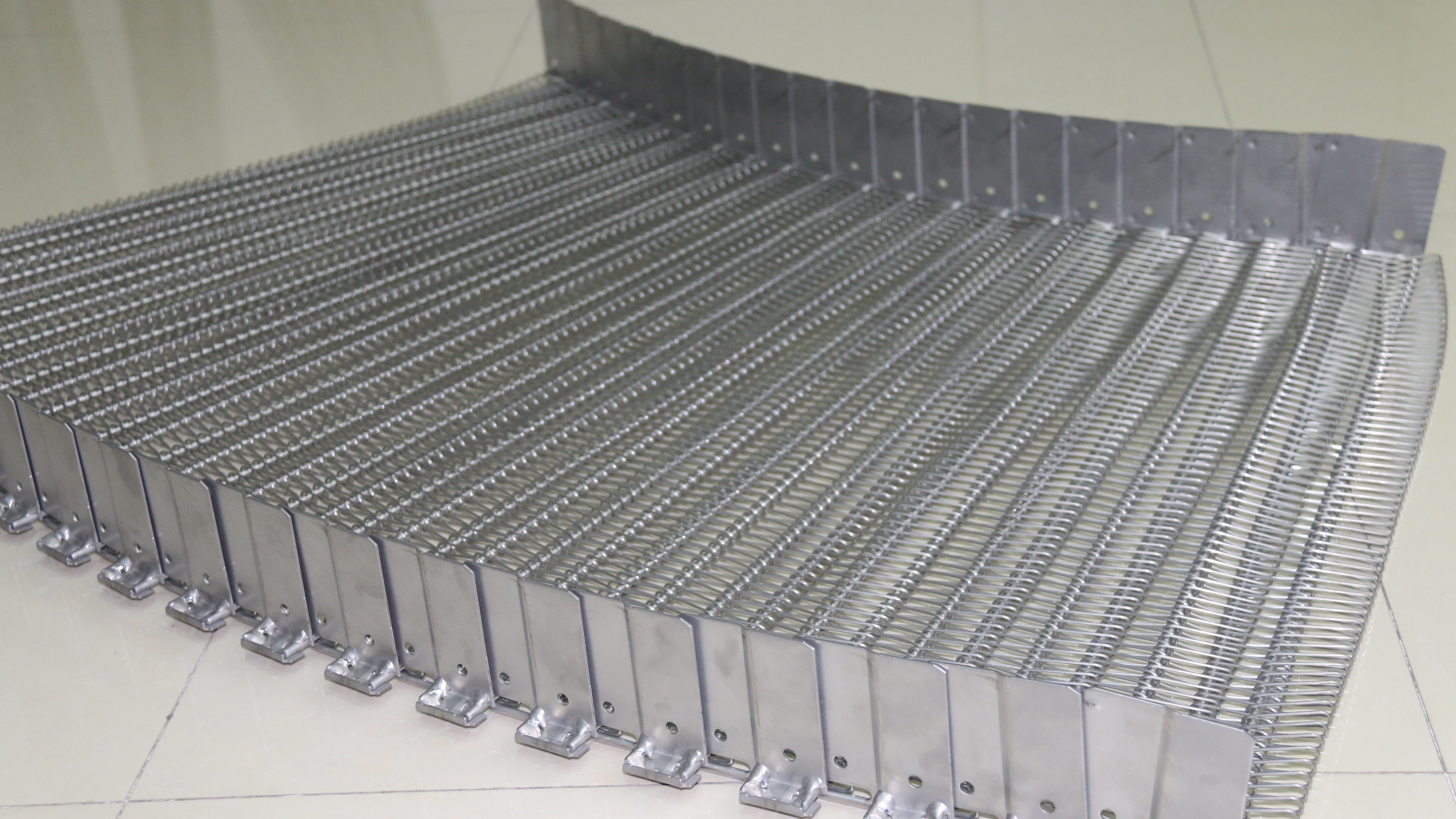 優(yōu)質的【金屬輸送帶】如何產生